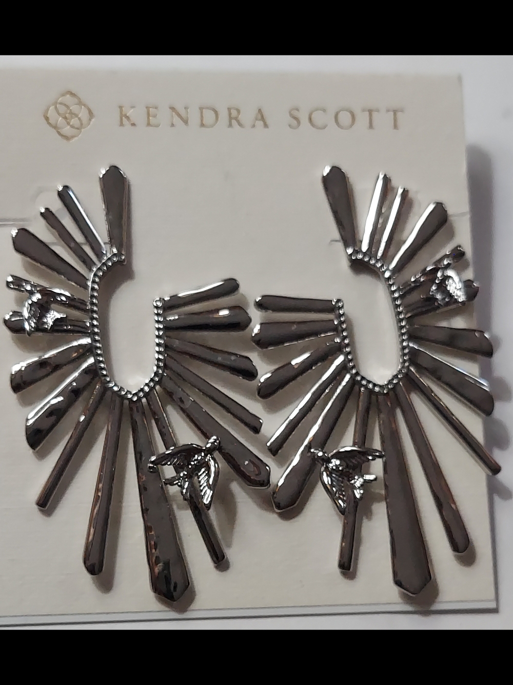 Kendra Scott Melody Bird Silver Hoop Earrings featuring a sunburst design